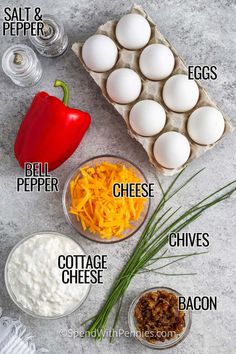 ingredients to make an egg recipe laid out on a table