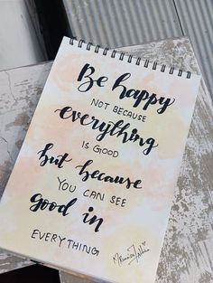 a notepad with the words, be happy not because everything is good but because you can see god in everything