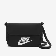 A clean design that fits your style and your essentials, the Nike Sportswear Crossbody Bag features a zipper back pocket and magnetic flap close. It's made from fabric that contains a blend of at least 65% recycled fibers. Nike Crossbody Bag, Nike Purses, Nike Sportswear Women, Nike Bags, Paris Trip, Pocket Books, Oakland Raiders, Nike Store, Sporty Outfits