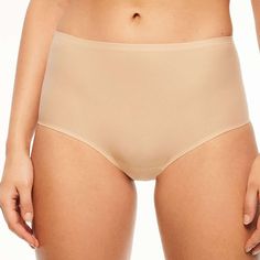 The Chantelle Soft Stretch Brief panty is a wardrobe must-have. Stay comfortable all day in this seamless brief. Eliminates visible panty lines with a smooth laser-cut edge. The seamless full brief from the pioneering one-size underwear program truly fits. This innovative style has a luxe, high-performance fabric that is engineered to last, retain its stretch and adapt to all body types. 360 Degree Adaptable Stretch with moisture wicking, lightweight and breathable. Fits XS-XL for full coverage or up to 2X for lower coverage. Loved by editors and customers alike, the award-winning underwear is an easy fit for any season. Style# C2647 Style: Soft Stretch Seamless Full Brief Fabric: Body: 80% Polyamide, 20% Elastane. Gusset: 100% Cotton. Design: Seamless high-waisted full brief. Luxe stretch Beige No-show Shapewear With Soft Touch, Beige No-show Soft Touch Shapewear, Beige Soft Touch Intimate Briefs, Supportive Beige Shapewear Briefs, Beige Shapewear Briefs, Elegant Seamless Second-skin Bottoms, Innovative Fashion, Performance Fabric, Bra Sizes