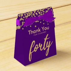 a purple gift bag with the words, thank you for coming forty and gold confetti on it