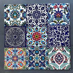 an assortment of colorful tiles with designs on them