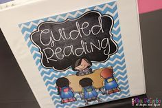 a binder with the words guided reading written on it and three children sitting at a desk