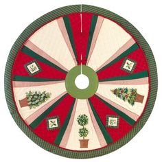 a quilted christmas tree skirt with potted trees on the center and green trimmings