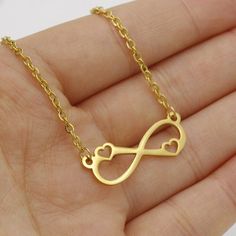 5pcs 45cm Stainless Steel Hollow Love Infinity Pendant Necklace , 8 Word Pendant Necklace, Stainless DIY Supplies, Jewelry Findings✿ QTY: 2pcs✿ Chain Length:18"(45cm) ✿ Material: 316 Stainless Steel✿Color: Gold ✿ Nickel Free & Lead Free***Stainless steel is the great metal to use for hand stamping, engraving, etc..because it will not tarnish, is hypo-allergenic and has amazing durability.All 316 Stainless Steel Link:https://www.etsy.com/shop/gemstones2u/items?ref=seller-platform-mcnav&se Gold Alloy Charm Necklaces For Valentine's Day, Gold Alloy Charm Necklace For Valentine's Day, Valentine's Day Gold Charm Necklace In Alloy, Infinity Metal Necklace For Gifts, Infinity Metal Necklace For Gift, Alloy Charm Necklaces For Mother's Day Gift, Infinity Necklace With Lobster Clasp As Gift, Mother's Day Alloy Charm Necklaces As Gifts, Mother's Day Alloy Charm Necklace Gift