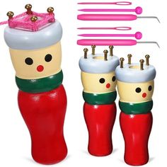 the toothbrush holders are decorated like santa's boots and have been placed on top of each other