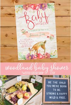 the woodland baby shower sign is shown with flowers and deer