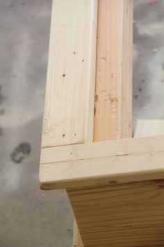 an unfinished piece of wood sitting on top of a table