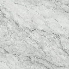 a white marble textured surface with grey veiners