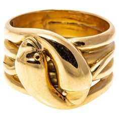 18k yellow gold ring. This striking, contemporary ultra wide four row band ring is an intertwining serpent motif of two bypassing snakes, with a high polished finished body. Marks: 18k Dimensions: 9/16" wide at center Weight: 12.5 gross dwt Unique Yellow Gold Ring, Wide Diamond Bands, 1980s Bands, Serpent Ring, Unusual Rings, Gold Beauty, Gold Statement Ring, Contemporary Ring, Ultra Wide