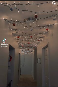 the hallway is decorated with christmas lights and ornaments