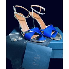 These Sandals From The House Of Malone Souliers Are All About Class And Elegance! They Are Made From Blue-Silver Foil Leather And Fabric On The Exterior, Open Toes, Gold-Tone Hardware, And 10.5 Cm Heels. These Sandals Have Been Equipped With A Buckle-Type Closure. Includes Original Dustbag, Original Box Size 40 Eu/9.5 Us Exterior Material Fabric, Foil Leather Lining Material, Leather Insole Material, Leather Sole Material, Origin Italy; Hardware Gold Tone, Closure Type Buckle, Outsole Length 22. Malone Souliers, Ankle Strap Heels, Silver Foil, Leather Fabric, Strap Heels, Blue And Silver, Blue Gold, Shoes Women Heels, Ankle Strap