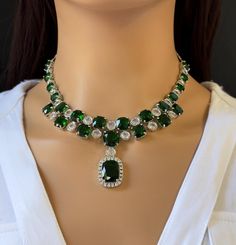 Emerald CZ diamond necklace, American Diamond wedding necklace, Cz jewelry, Indian, Pakistani, Punjabi wedding jewelry, Bridal necklace Regular Size And Adjustable with rhodium finish Earrings Length 2 inches  Ships from California, USA Delivery in 2-5 business days in the USA. Other colors can be found here https://www.etsy.com/listing/1423097794/sapphire-cz-diamond-bridal-necklace?ref=listings_manager_grid https://www.etsy.com/listing/1423095388/emerald-cz-diamond-bridal-necklace?ref=listings_ Exquisite Emerald Necklace For Wedding, Fine Jewelry Emerald Necklace With 17 Jewels For Wedding, Exquisite Emerald Necklace With Diamond Cut For Wedding, Wedding Diamond Necklace With Jewels In Cubic Zirconia, Wedding Diamond Necklace With Cubic Zirconia, Wedding Cubic Zirconia Diamond Necklace, Anniversary Emerald Necklace With Cubic Zirconia Jewels, Wedding Diamond Necklace With Jewels, Luxury Crystal Rhinestone Necklace For Wedding