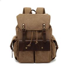 Canvas Backpack Travel Backpack Weekender Backpack We use selected full grain leather, quality canvas material, anti-rust hardware, and to make the bag as good as it is. This bag is perfect as your everyday bag, which can fit a 15'' Laptop, an IPAD, A4 files, books, magazines, as well as many accessories. Features: 1. Inside an anti-shock laptop sleeve for laptops 2. Large storage spaces including the main compartment 3. Inside zipper pocket, cell pocekt, purse pocket, laptop sleeve Specifications: Dimensions: 13'' L/16.5''H/6''W (33cm/42cm/15cm) Color: Khaki/Grey/Black/Army Green Processing Time: 1-3 business days Shipping Time:Standard Shipping: 20-30 Days (there maybe some more days delay because of global epidemic effect)Fast Shipping: 5-7 Days Casual Leather Travel Bag With Canvas Lining, Coated Canvas Standard Backpack For Travel, Large Capacity Canvas Laptop Backpack, Canvas Leather Backpack For Everyday Use, School Backpack With Canvas Lining, Casual Leather Backpack Travel Bag, Everyday Canvas Leather Backpack With Leather Handles, Brown Coated Canvas Standard Backpack, Canvas Backpack For Outdoor