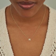 Handcrafted in 18k yellow gold, our diamond mini four leaf clover necklace is punctuated with white diamonds. A playful design and symbol of good luck, wear this necklace to elevate your everyday layer. Fixed to a 16", 14-karat link chain Pendant measures approximately 0.4" x 0.3" Spring ring clasp Made with love in Los Angeles Complimentary gift wrapping provided Clover Jewelry, Four Leaf Clover Necklace, Gold Link Chain, Clover Charm, Diamond Eyes, Elephant Necklace, Clover Necklace, Four Leaf