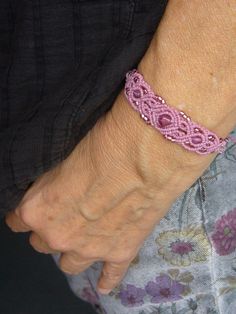 Filigree macrame bracelet in pink with incorporated glass beads, bicones and rocailles. It closes with a sliding clasp and can be individually adjusted to the wrist. Maximum slip width approx. 20 cm, for narrow hands! Knotted with waxed polyester yarn (Linhasita) Delivery time Germany 3-5 days. Delivery time to countries within the EU 7 to 14 days Shipping with tracking Pink Adjustable Macrame Bracelets, Adjustable Pink Macrame Bracelets, Adjustable Pink Macrame Bracelet, Pink Macrame Braided Bracelets As A Gift, Adjustable Pink Macrame Beaded Bracelets, Pink Macrame Bracelets As Gift, Pink Macrame Braided Bracelet As Gift, Adjustable Pink Macrame Beaded Bracelet, Pink Macrame Bracelets For Gift