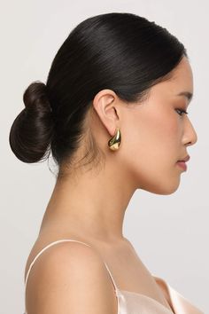 Go bold! These gold teardrop earrings are ready for their high-fashion moment. Available in Gold. Shop Birdy Grey! Bold, gold teardrop earrings that feel ultra-light on the ears. | Gold Jewelry | Birdy Grey Mayfair Teardrop Earrings Gold Teardrop Pendant Earrings For Party, Chic Gold Teardrop Hoop Earrings, Elegant Gold-tone Teardrop Hoop Earrings, Chic Gold Teardrop Earrings For Party, Modern Gold Teardrop Crown Earrings, Gold Modern Teardrop Earrings, Chic Gold Teardrop Earrings For Pierced Ears, Gold Teardrop Hoop Earrings For Party, Gold Teardrop Earrings For Party