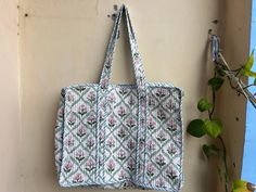 Women Tote Bag Handmade Block Printed Quilted Shoulder Bag's Indian Shopping Handbag Throw Cotton Quilted block print weekend bags 100% cotton fabric SIZE:- 14 inch X 17 Inch X 6 Inch Usage : Cosmetic, Make-up, Travel, Toiletries, Tote Bag, Medicine, Accessories, Shoulder Bags, Handle Bag, Women Bags, Cosmetic Bag, Gift For Her, Bridesmaid Bag, Storage Bag, Grocery Bag, Shopping Bag, Carry Bags, Jhola Bag, Market Bag, Vintage Bags, Picnic Bags, Etc Shopping and much more. Perfect for Beach Visits/ Quick Grocery runs/ Carrying Kids items/ Artist Paint book and Paints /Extra Bag Washable on Cold / Delicate wash Gorgeous Prints of Hand printed cotton are brought together to give an alternate to plastic bags usage . Posted in a flat pack folded. Rectangular Block Print Bags For Daily Use, Green Reversible Rectangular Bag, Multicolor Reversible Cotton Bag, Reversible Cotton Rectangular Bag, Rectangular Cotton Reversible Bag, Weekend Bags, Floral Tote Bag, Bridesmaid Bags, Picnic Bag