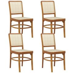 set of four chairs with woven seats