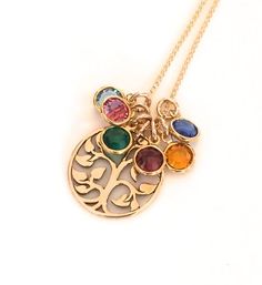 This simple and elegant necklace is a beautifully detailed 3/4" bronze tree of life pendant that comes hung on an 18" 14k gold filled chain.  If you choose, you can order the optional Swarovski crystal bezel set birthstone crystals.  This is a beautiful eye-catching keepsake for any mother or grandmother.Each necklace comes boxed all ready to gift.  I also include a small disposable polishing cloth to keep your new keepsake looking beautiful.Please let me know in the "Notes to Tomi's Treasures" Nickel-free Gold Birthstone Necklace For Anniversary, Gold Nickel-free Birthstone Necklace For Anniversary, Gold Nickel-free Birthstone Necklace Perfect As Gift, Mother's Day Tree Of Life Necklace Gift For Mom, Nickel-free Gold Birthstone Necklace For May, Mother's Day Gold Birthstone Necklace, Nickel Free, Tree Of Life Jewelry For Mother's Day Gift, Mother's Day Tree Of Life Round Pendant Jewelry, Tree Of Life Round Pendant Necklace For Mother's Day