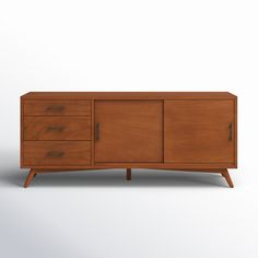 the sideboard has three drawers and two doors