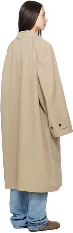 Washed cotton poplin trench coat. · Button fastening at spread collar · Concealed button closure · Welt pockets · Raglan sleeves · Adjustable button tab at cuffs · Horn hardware Supplier color: Light taupe Cotton Poplin, Welt Pocket, Raglan Sleeve, The Row, Trench Coat, Collar, Color