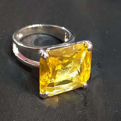 "Sterling silver ring with yellow (faux topaz) CZ.  Beautiful craftsmanship.  CZ Size: 16mm Inner band stamped \"925\" Yellow Topaz is a birthstone for November. ► SHIPPING Ships from California via USPS. All vintage sterling silver jewelry may have antiquing or tarnish. See all other sterling silver and cubic zirconia rings here: https://www.etsy.com/shop/BlueMoonTrader?section_id=36603828" Vintage Sterling Silver Jewelry, Silver Gift Wrap, Zirconia Rings, Birthday Ring, Cubic Zirconia Rings, November Birthstone, Silver Gifts, Ring Vintage, Statement Ring