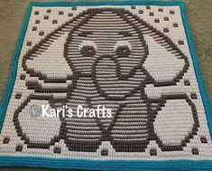 a crocheted blanket with an elephant on it that says karl's crafts