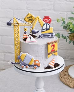 a cake with construction themed decorations on it