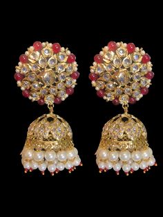 Ready to ship jhumka  large  made using shell pearls , cz polki and gold plated  length 3.2 inches Gold Bollywood Ruby Jhumkas, Bollywood Style Gold Ruby Jhumkas, Ruby Beads, Silver Jewelry Earrings, Pretty Necklaces, Silver Jewelry Pendant, Jewelry Design Necklace, Delicate Jewelry, Gold Set