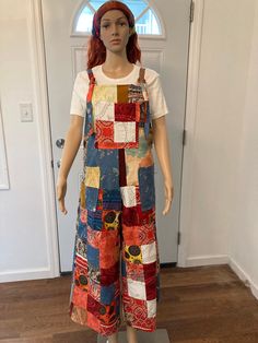 "Size medium womens wide leg patchwork overalls.  These overalls were constructed with fabric repurposed and recycled from thrifted clothing and vintage fabric scraps.  There is a pocket on the bib and two pockets on the front below the waist.  There is denim, cotton and corduroy fabrics.  There is a southwestern feel to these overalls.  The hip is 46\"  and the inseam is 30\" .  The straps are fully adjustable with metal D-rings." Leg Patchwork, Patchwork Overalls, Womens Overalls, Thrifted Clothing, D Rings, Denim Cotton, Overalls Women, Halloween Sweatshirt, Vintage Fabric