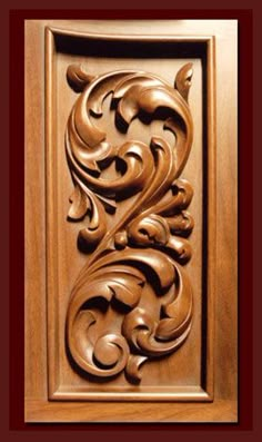 carved wood paneling with an intricate design on the front and back side of it