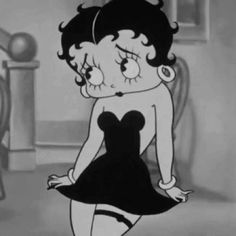 an animated image of a woman in a black and white dress with her hands on her hips