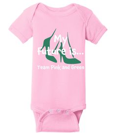 Future Team Pink & Green onesie. The onesie is on a pink garment with My Future is Team Pink & Green words and heels incorporated within the graphic. 5-ounce, 100% combed ring-spun cotton 1x1 baby rib Side-seamed Flatlock seams Double-needle ribbed binding on neck, shoulders, sleeves, and leg openings Innovative three-snap closure Pink Cotton Onesie With Graphic Print, Pink Letter Print Onesie For Gender Reveal, Fitted Pink Onesie With Letter Print, Pink Cotton Bodysuit With Letter Print, Pink Short Sleeve Onesie For Gender Reveal, Fitted Pink Bodysuit With Letter Print, Pink Fitted Cotton Onesie, Fitted Pink Cotton Onesie, Green Words