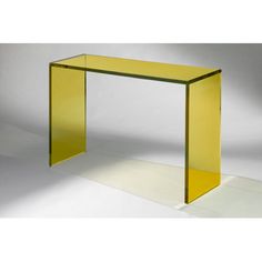 a glass table with a yellow frame on the top and bottom, in front of a white background