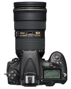 a camera with a lens attached to it's body and the top portion is shown