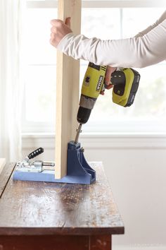 Home and lifestyle blogger Liz Fourez shows how to make a simple bench with storage that would be perfect for an entryway or at the foot of a bed. Follow her easy step-by-step photo tutorial to create this beautiful DIY bench! Entryway Bench With Storage, Diy Mantle, Diy Fireplace Mantle, Dutch Boy Paint, Diy Fireplace Mantel, Diy Entryway Bench, Diy Mantel, Making A Bench