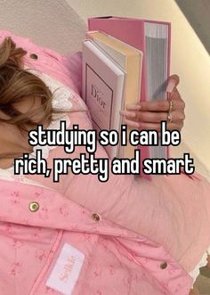 a woman laying in bed reading a book with the words studying so i can be rich, pretty and smart