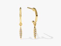 Our Diamond Droplet Huggie Earrings are a modern take on the classic hoop earring. They are made to order and can be made in 14K or 18K gold.FEATURES• Made to Order• Gold Kt: 14k Solid Gold, 18k Solid Gold• Gold Color: Rose Gold, Yellow Gold, White Gold• Width x Height: 20.00 mm x 1.20 mm• Inner Diameter: 8.00 mm• Gemstone: Diamond, Moissanite• Diamond Cut: Round• Diamond Color - Clarity: G Color - SI1 Clarity• Number of Stones and Size: 4 x 1.00 mm, 4 x 1.10 mm, 2 x 1.30 mm in total• Total CTTW Gold Small Hoop Diamond Earrings In Minimalist Style, Modern Yellow Gold Dangle Huggie Earrings, Minimalist Yellow Gold Dangle Huggie Earrings, 14k Yellow Gold Huggie Dangle Earrings, Yellow Gold Dangle Huggie Earrings Fine Jewelry, Yellow Gold Teardrop Huggie Earrings With Ear Wire, Everyday Yellow Gold Teardrop Diamond Earrings, Everyday Yellow Gold Diamond Drop Earrings, Band Necklace