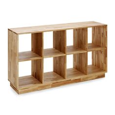 a wooden shelf with six compartments on each side