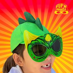 Created by a mom toy designer, Flip'N Hats was made for love for her 2 kids, as a fun & functional solution to claustrophobic costume masks and boring hats. TIRED OF BORING HATS? Our patent pending all-in-one hat, mask & 100% UV Protection sunglasses provide plenty of sun protection and are fun to wear. Your kids will not want to take it off! FUN-CTIONAL! Parents love the functionality & versatility of our hats - clean, safe mask, that also provides sun protection with UV400 lenses. Kids love th Dinosaur Costume Kids, Costume Dinosaure, Dino Mask, Mask Sunglasses, Dinosaur Hat, Kids Hat, Dinosaur Costume, Costume Masks, Unique Birthday Gift