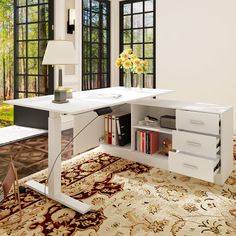 a white desk sitting in front of a window