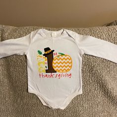 My First Thanksgiving Unisex Baby Bodysuit Size 18-24months This Is New Without Tags- Never Worn Nor Washed. Perfect For Ur New Little One For The Thanksgiving Holliday. Would Look Adorable With Little Jeans. Please Message Me With Any Questions U Have. My First Thanksgiving Shirt, Thanksgiving Onesie Boy, My First Thanksgiving Onesie, First Thanksgiving, Unisex Baby, Baby Bodysuit, Little One, Kids Shop, Thanksgiving