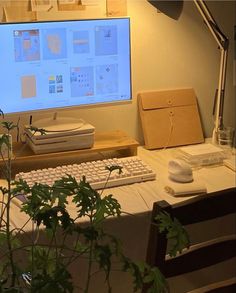 a computer monitor sitting on top of a desk