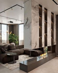 a modern living room with marble walls and flooring