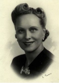 an old black and white photo of a woman