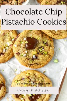 chocolate chip pistachio cookies on parchment paper