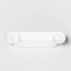 a white tray with two compartments on it