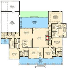 this is the first floor plan for a house with two master suites and an attached garage