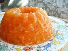 a bundt cake sitting on top of a blue and white plate